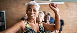 Woman dancing with friends