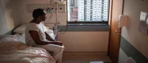 hospital patient say on bed