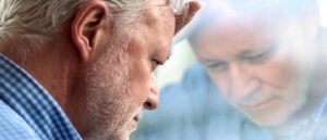 depression, man looking out window