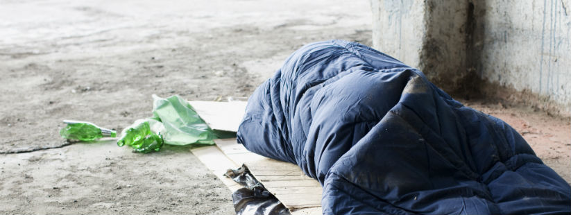 person sleeping on street, homelessness