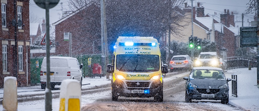 Ambulance driving on a winter's day