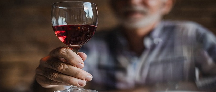 man with glass of wine, alcohol misuse, alcohol addiction, alcohol abuse