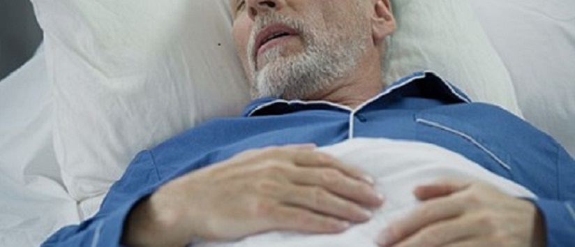 Man sleeping in a hospital bed, sleep quality