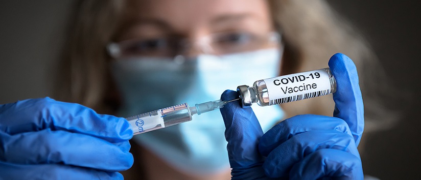 Doctor holding Covid-19 vaccine