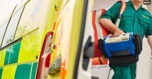 Ambulance staff treating heart attacks
