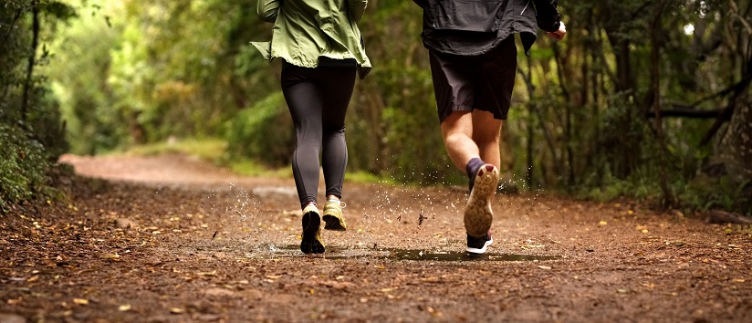 two people running together, exercising outside, boosting cardiovascular health