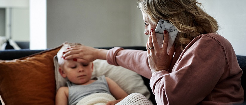 Woman calling NHS 111 for sick daughter