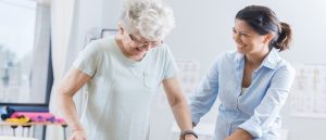 Frail patient having physio