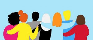 Abstract group of people with arms around each other