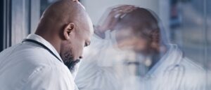 Doctor looking stressed