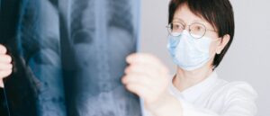 radiographer looking at scan