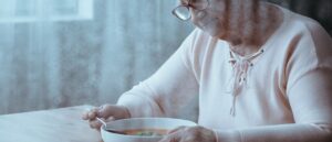Eating disorders in older people, older women eating soup