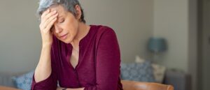 older woman, sad headache, menopause